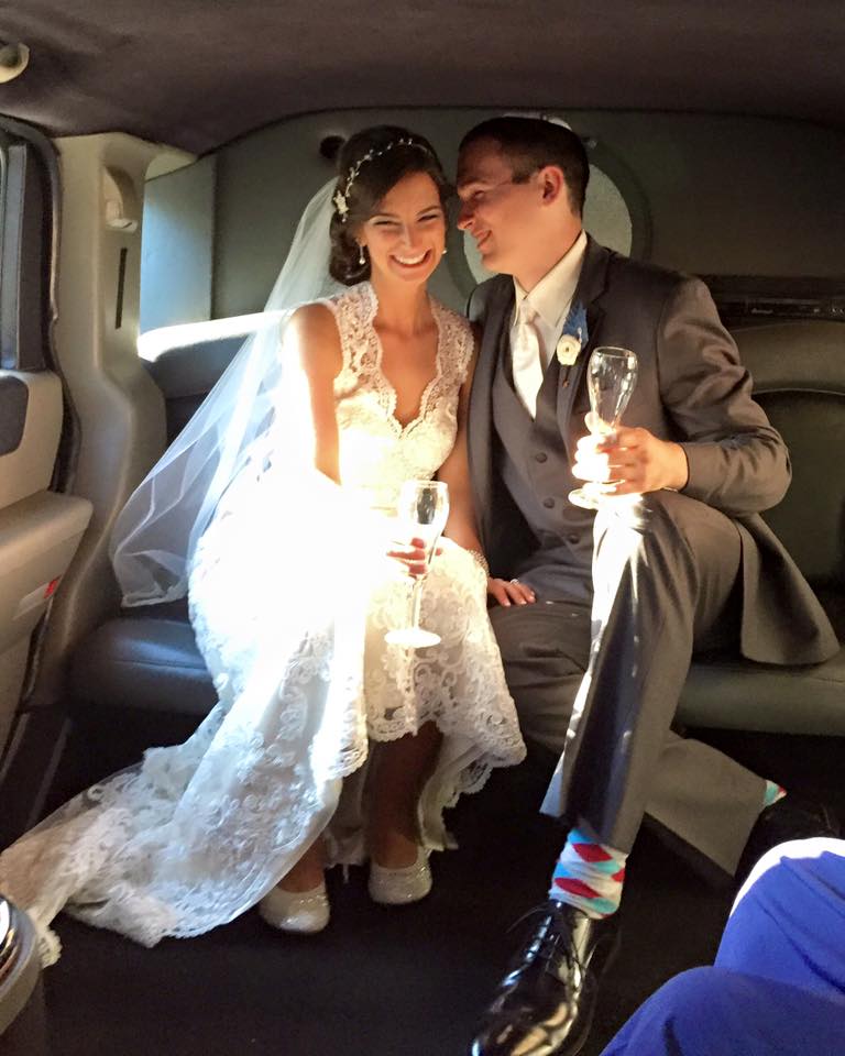 Wedding Couple in a Motortoys Limousine H2 Hummer Limo